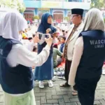 Tim WarCil SDM Limas saat Liput Simulasi Salat Idulfitri 1446 Hijriyah di Halaman Sekolah.