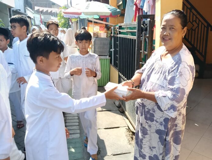 Indahnya Berbagi dalam Gebyar Maulid Nabi Indahnya Berbagi dalam Gebyar Maulid Nabi